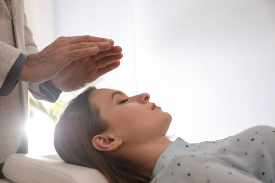 A woman laying down for therapy